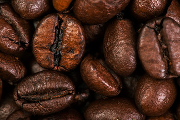 Dark Roasted Coffee Beans Caffeine Brown Espresso wallpaper close up. Fried  Coffee Beans Texture macro