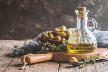 Olive oil and bowl of olives