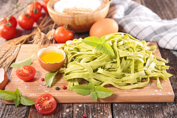 raw tagliatelle with ingredients