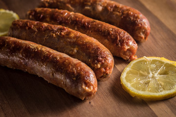 Hot spicy calabrian sausage on the grill