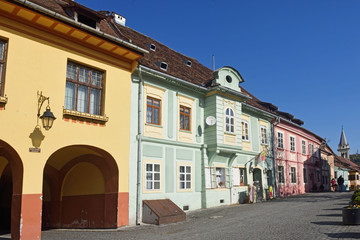 houses at Citadel Square in Historic Centre of Sighisoara, Transylvania region in Romania