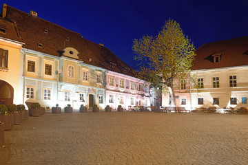 houses at Citadel Square in Historic Centre of Sighisoara, Transylvania region in Romania