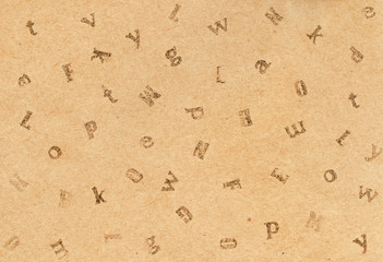 Brown craft paper with stamped letters