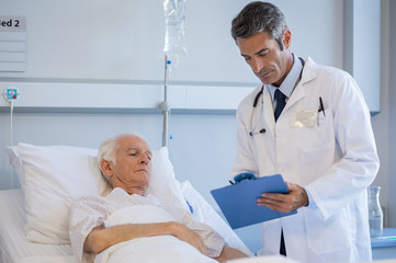 Senior doctor visiting patient