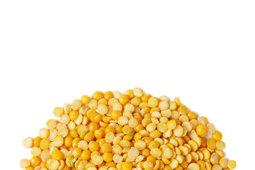 Dry yellow split peas isolated on white.