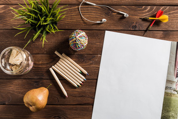 Blank book or magazine cover on wood background