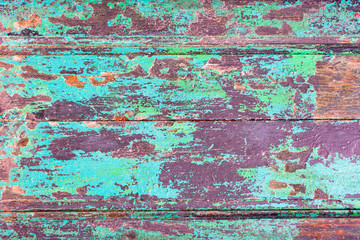Abstract grunge wood planks texture background with peeling blue paint