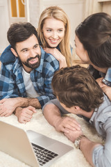 couples lying on floor and having fun