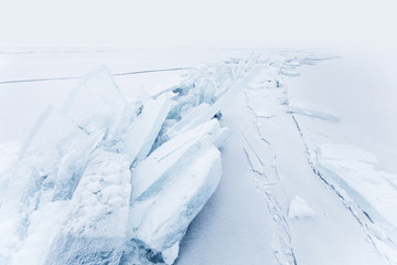 Fototapeta na wymiar Turquoise ice floe. Winter landscape. Baikal lake