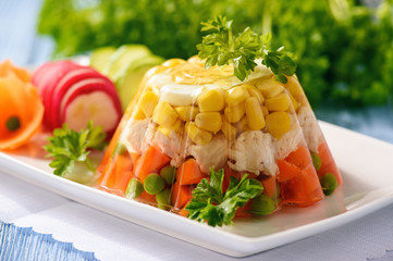 Aspic- jellied chicken with egg and vegetables. - obrazy, fototapety, plakaty