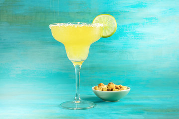 Margarita cocktail photo on vibrant background with copyspace
