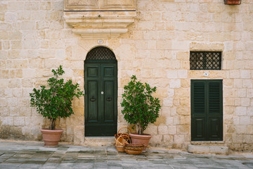 Facade of traditional maltese house in Mdina, Malta