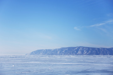 Naklejka na ściany i meble Lake Baikal ice. Blue sky. Winter landscape
