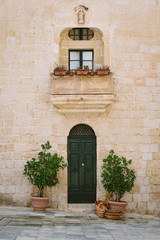 Fototapeta na wymiar Facade of traditional maltese house in Mdina, Malta