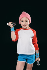 girl training with dumbbells isolated on black. athletics children concept