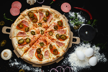 Pizza in black background
