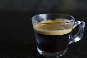 Hot coffee in a transparent cup