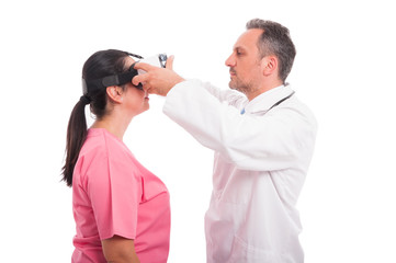 Medic adjusting vr glasses on nurse head