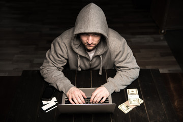 Hacker using laptop