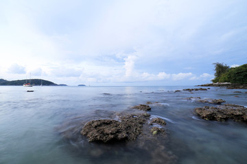Rock and wave on the Ao Sen beach Phuket Thailand