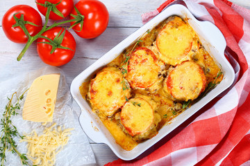 meat chops layered with vegetables and cheese