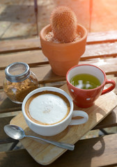 Hot cappuccino coffee in morning time.