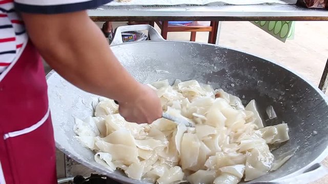 Coconut cooking in frying pan, Thai food and Dessert of Thailand