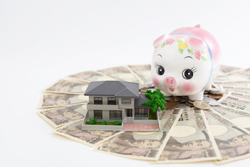 住宅模型と紙幣