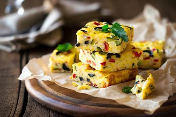Tuinposter Homemade vegetarian rice frittata with zucchini, bell pepper and olives © kuvona