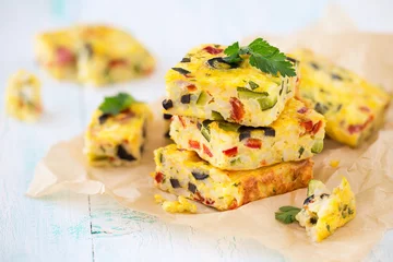  Homemade vegetarian rice frittata with zucchini, bell pepper and olives © kuvona