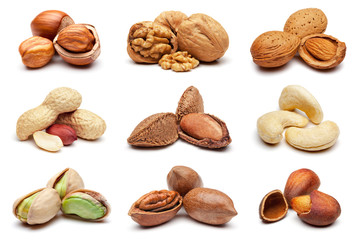 Collection of various nuts on white. - obrazy, fototapety, plakaty