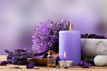 spa massage setting, lavender product, oil on wooden background - obrazy, fototapety, plakaty
