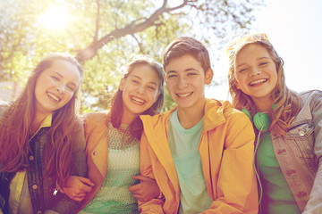 happy teenage students or friends outdoors