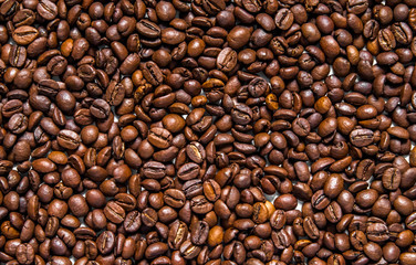 Mixture of different kinds of coffee beans. Coffee Background. roasted coffee beans.