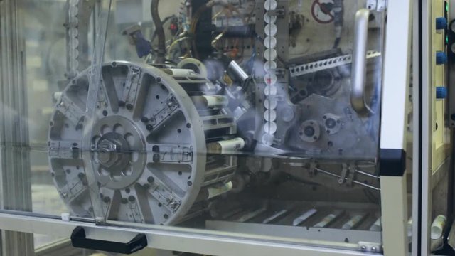 Rotating machine and conveyor belt. Industrial theme