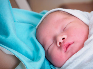 Happy Mother and Newborn Baby at the hospital