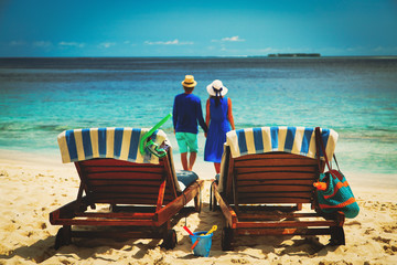 happy couple relax on a tropical beach
