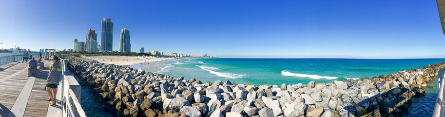 Naklejka premium MIAMI - FEBRUARY 2016: Panoramic view of Miami Beach from South Pointe Park. Miami attracts 15 million people annually