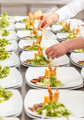 Cooks are preparing delicious appetizer dishes