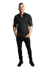 Handsome man in black shirt and black jeans, standing against a white background feeling great and comfortable with a smile.