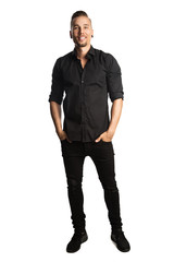 Fototapeta premium Handsome man in black shirt and black jeans, standing against a white background feeling great and comfortable with a smile.