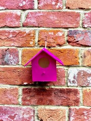 Pink bird house