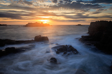 Fototapeta na wymiar Sunset at Cobo Bay