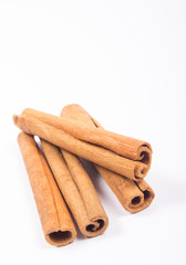 Cinnamon sticks isolated on white background.