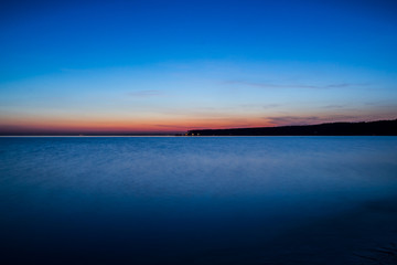 Summer sea sunset with waves