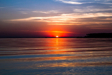 Fototapeta premium Summer sea sunset with waves