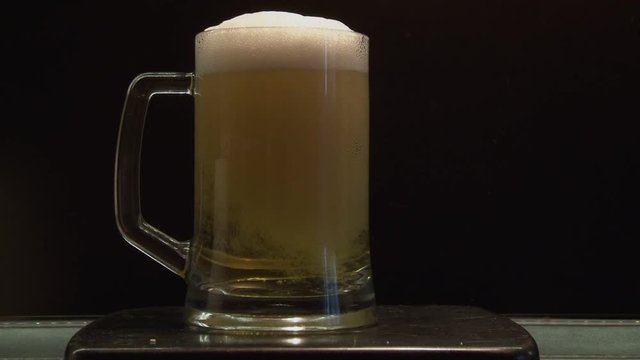 A large glass of cold and refreshing beer