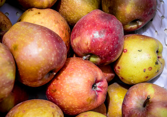 Apples are red in a box