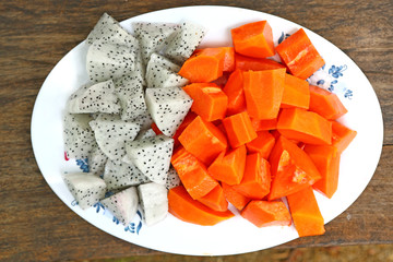 Delicious Chopped Ripe Papaya and dragon Fruit.