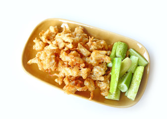 Golden fried mushroom with vegetables in plate.